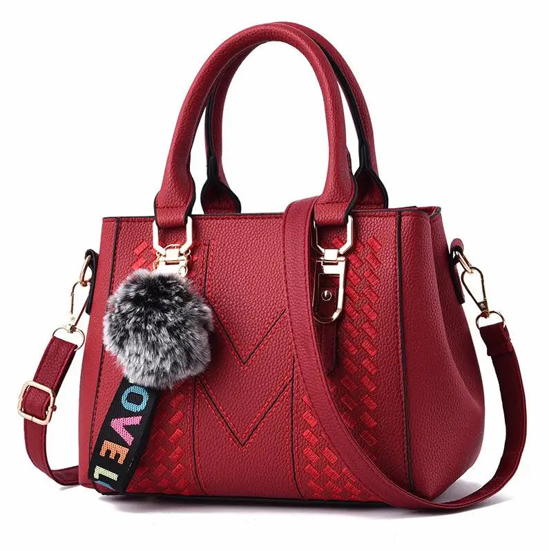 Embroidered leather bag