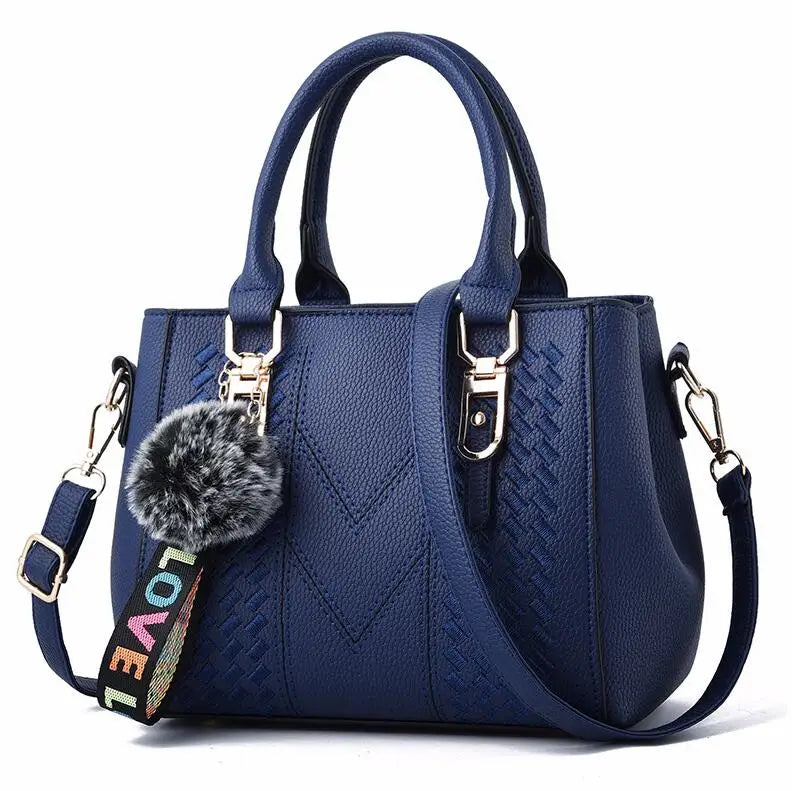 Embroidered leather bag