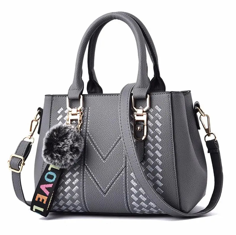 Embroidered leather bag