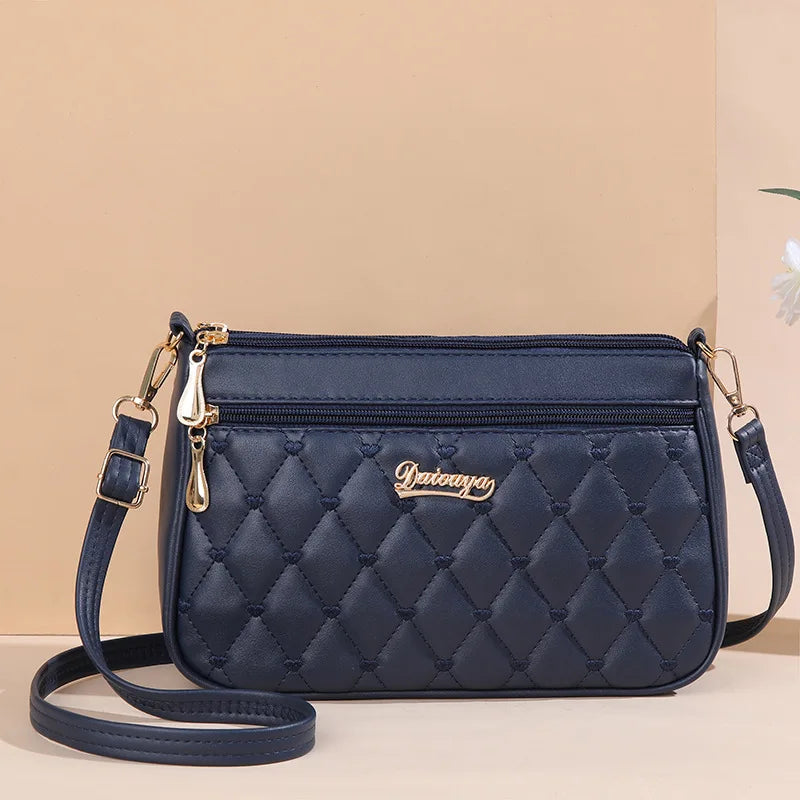 Embroidered leather bag