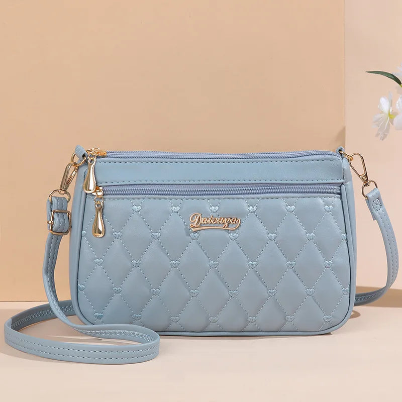 Embroidered leather bag