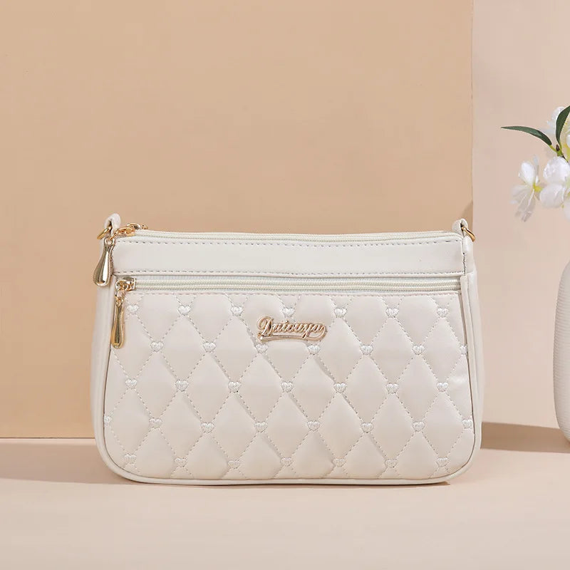 Embroidered leather bag