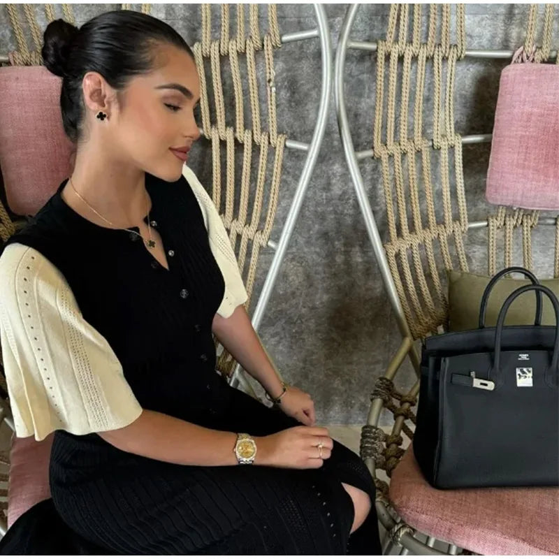 Short sleeves and high waist for a stylish fit.