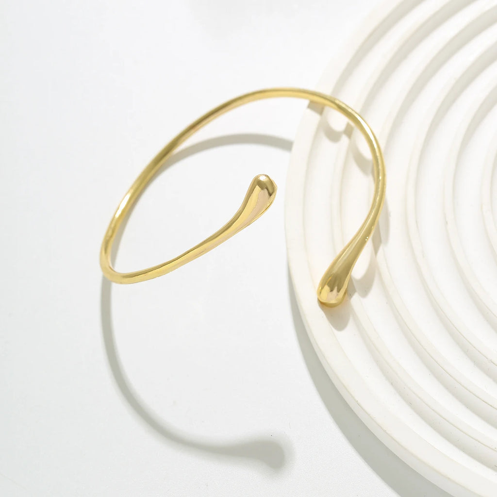 Open cuff water drop bracelet.