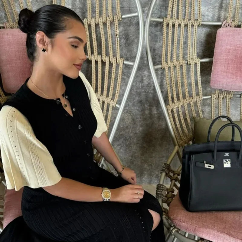 Short sleeves and high waist for a stylish fit.