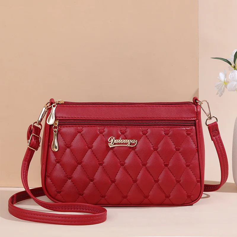 Embroidered leather bag