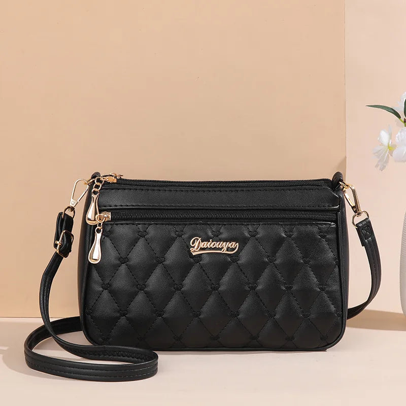 Embroidered leather bag